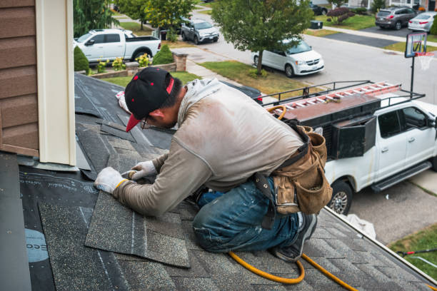 Professional Roof Replacement technician working in Cragsmoor, NY